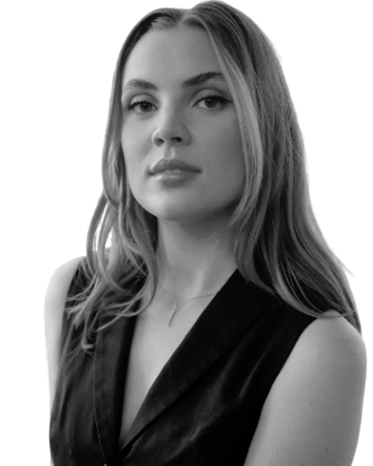 Woman wearing a black sleeveless top.
