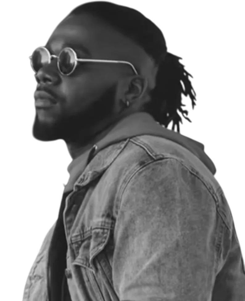 Man wearing sunglasses and a denim jacket.